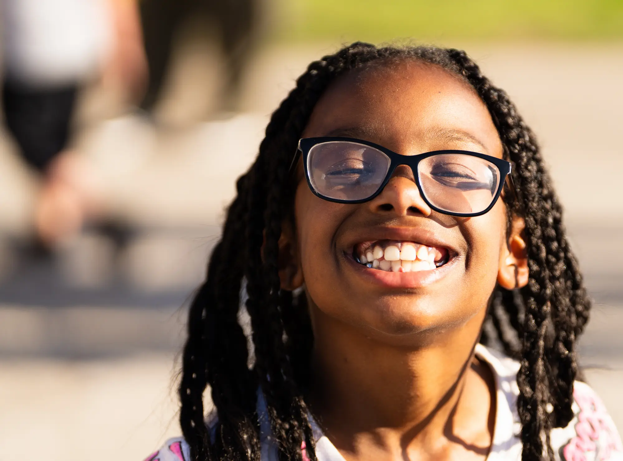 Girl smiling at a community event