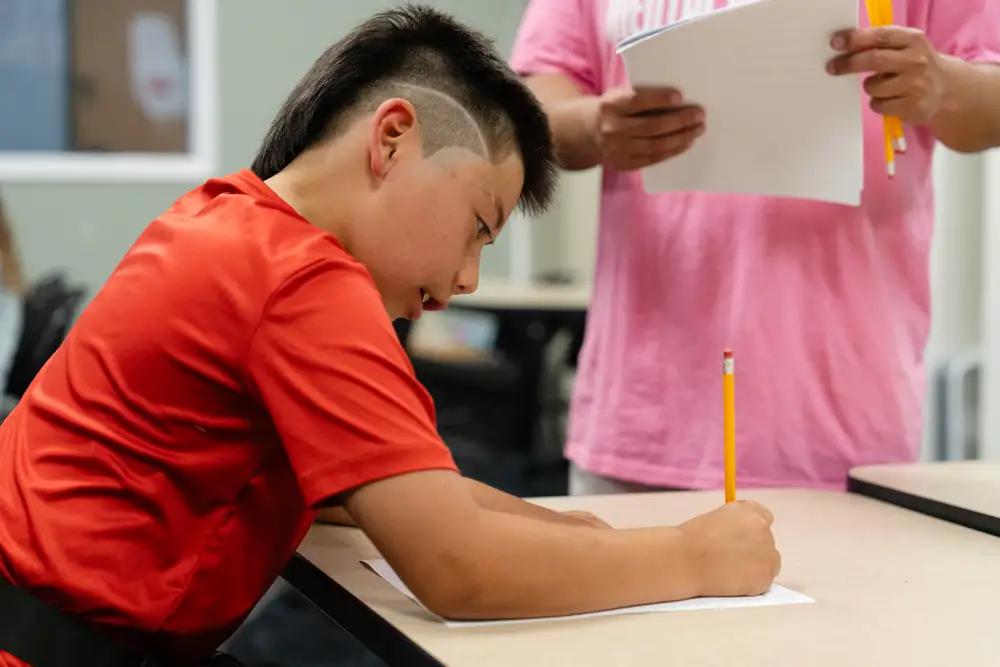 Child writing during an activity
