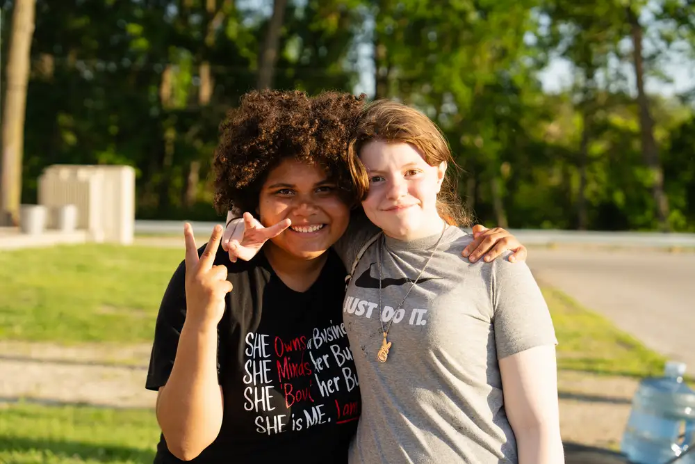 Two children smiling